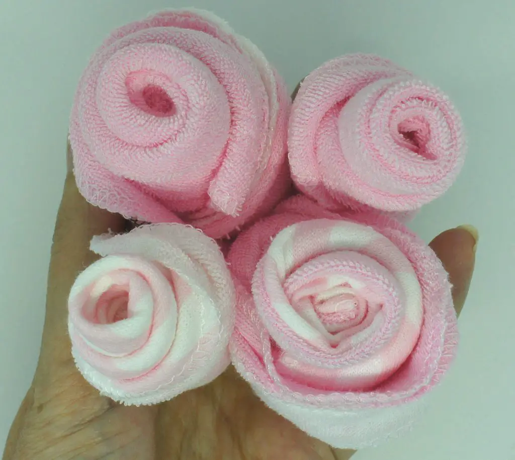 Washcloth roses - four pink