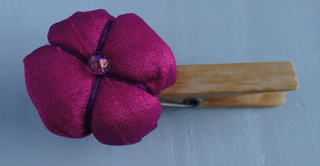 Silk ball flower on peg