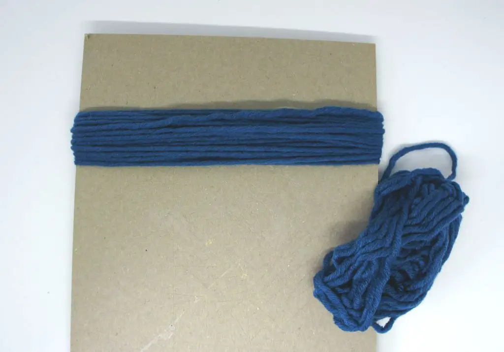 Yarn around cardboard