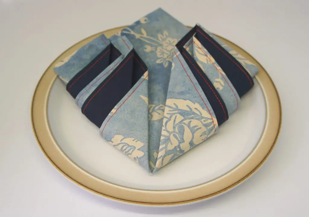 Folded fabric napkin