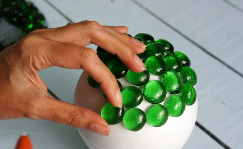 Applying beads to ball