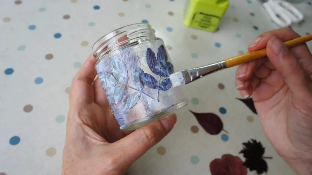 Applying second leaf to glass jar
