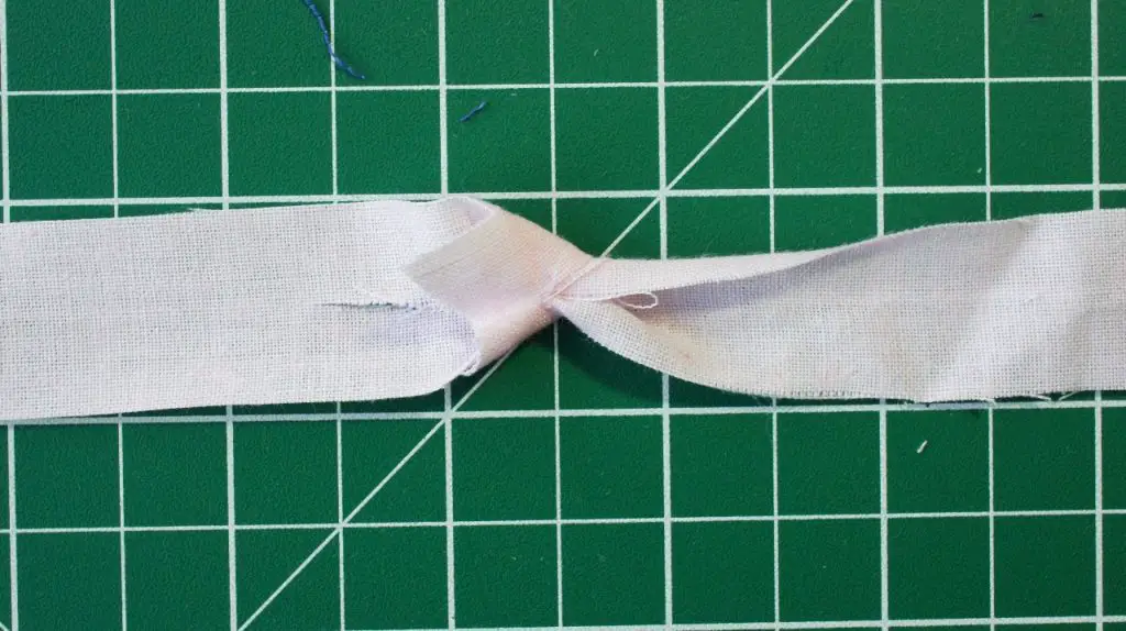 fabric strips joined and pulled tight