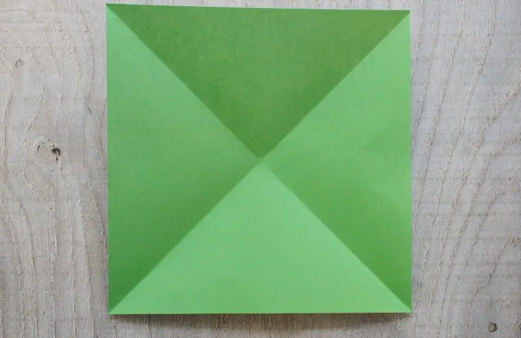 colored side of opened origami paper