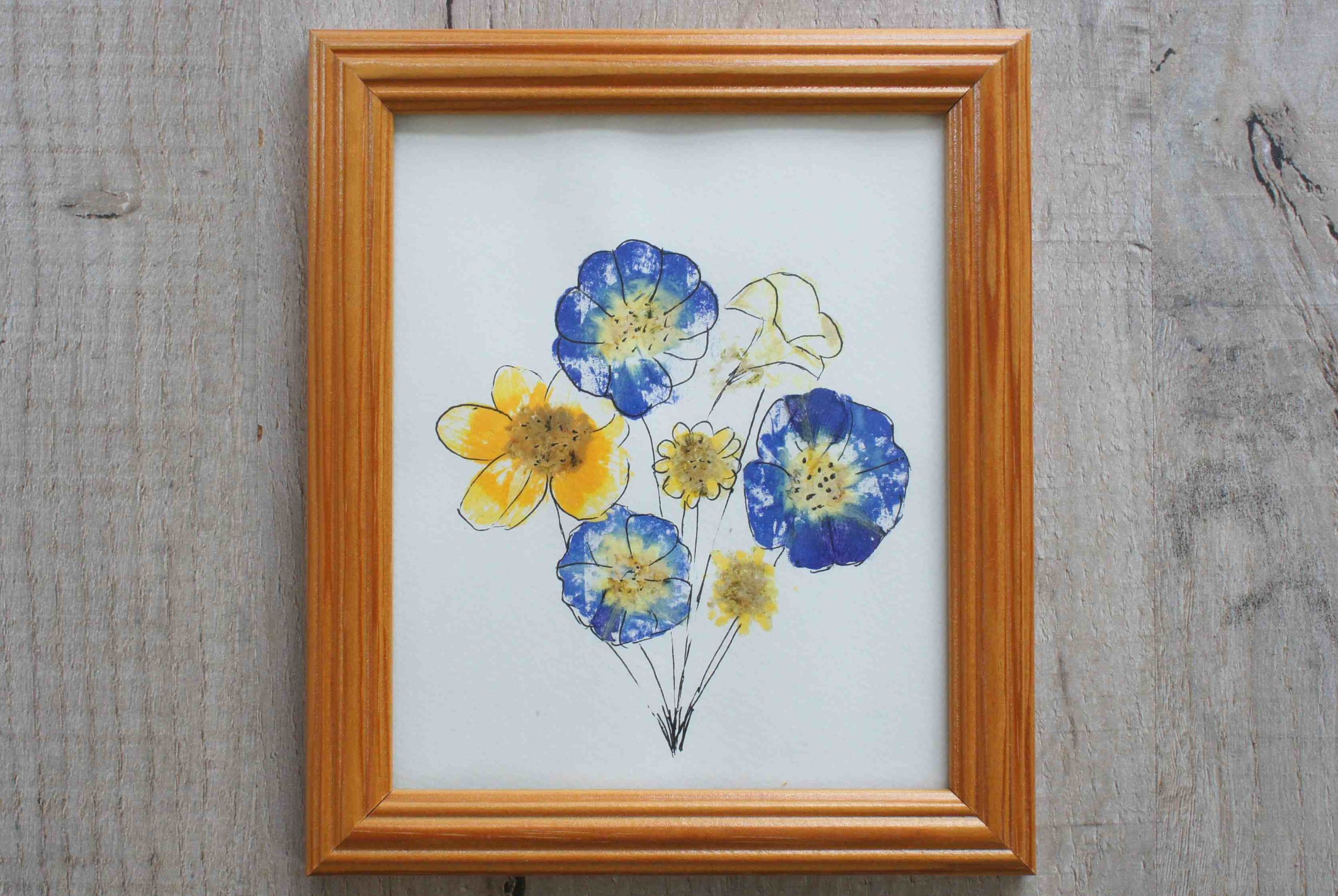 flower art in frame from flower pounding