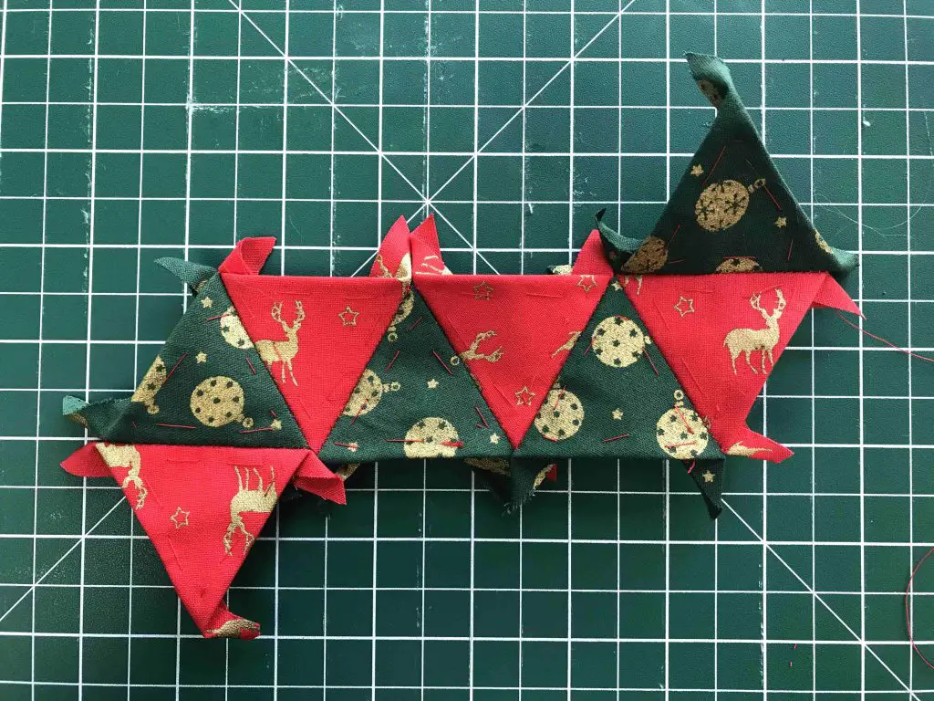 8 christmas triangles sewn together