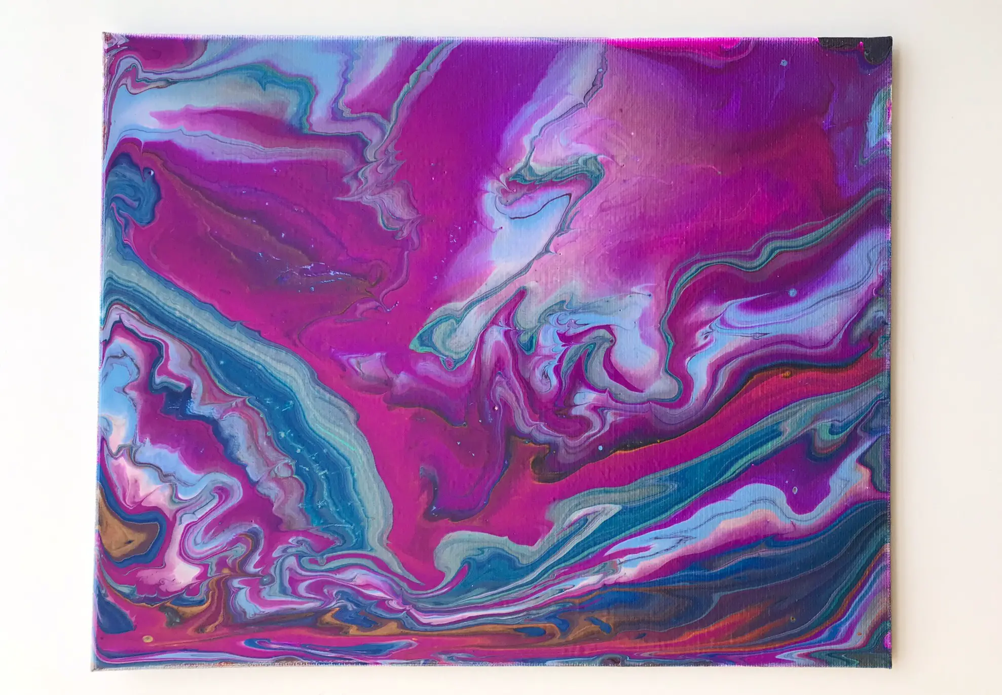 pink and purple acrylic pour painting art project