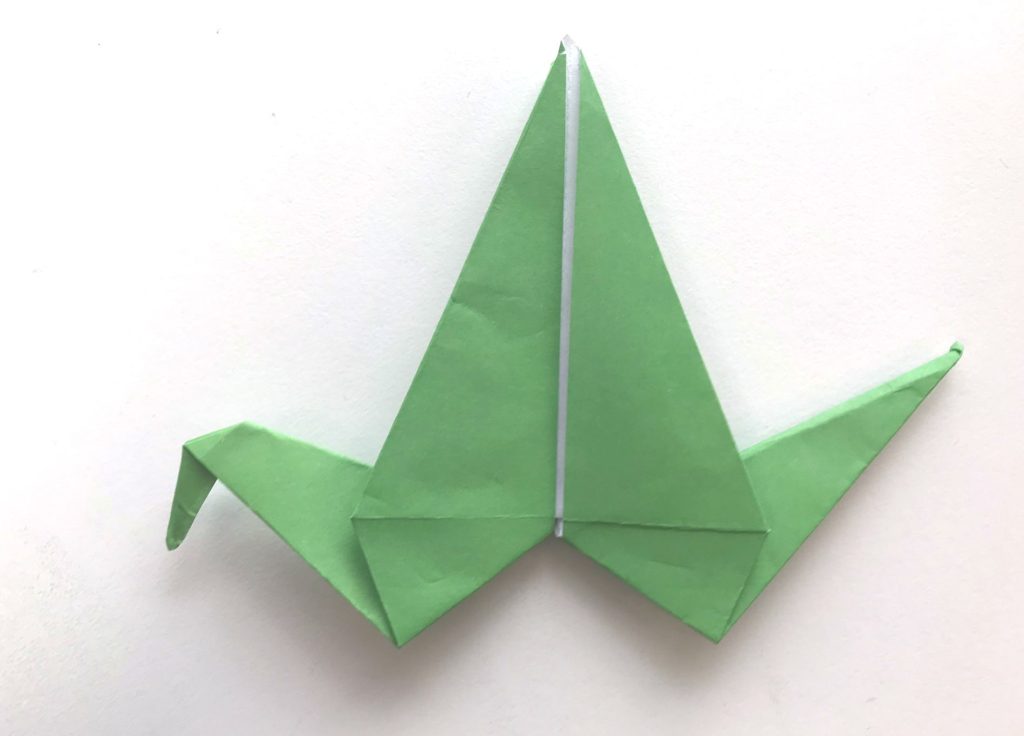 head and tail formed on Origami crane