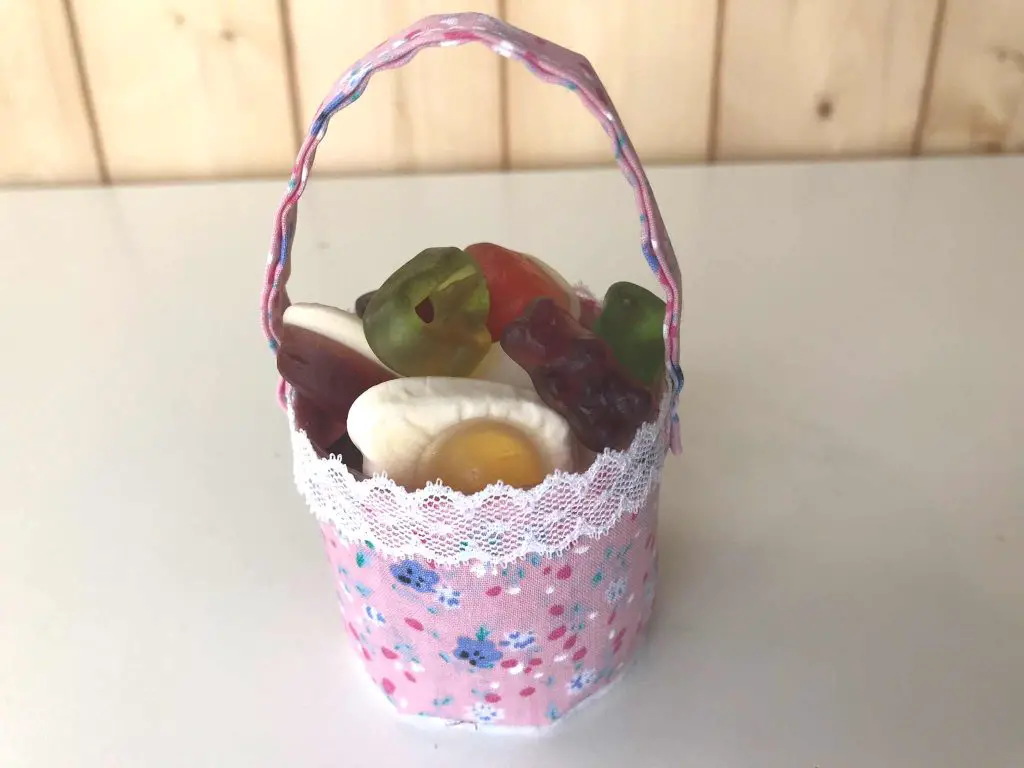 cute aerosol lid basket with sweets in it