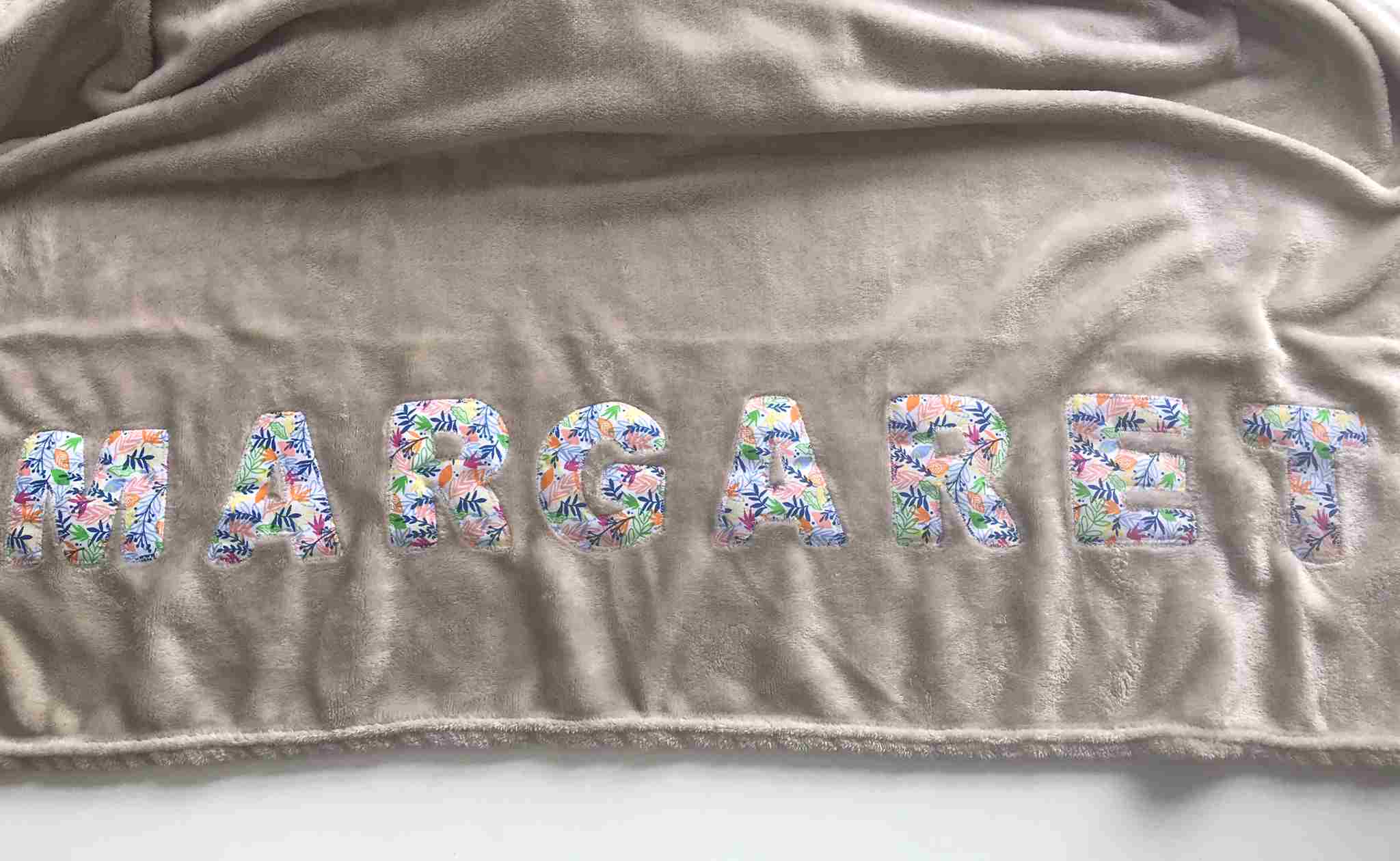 letters appliqued to dementia blanket