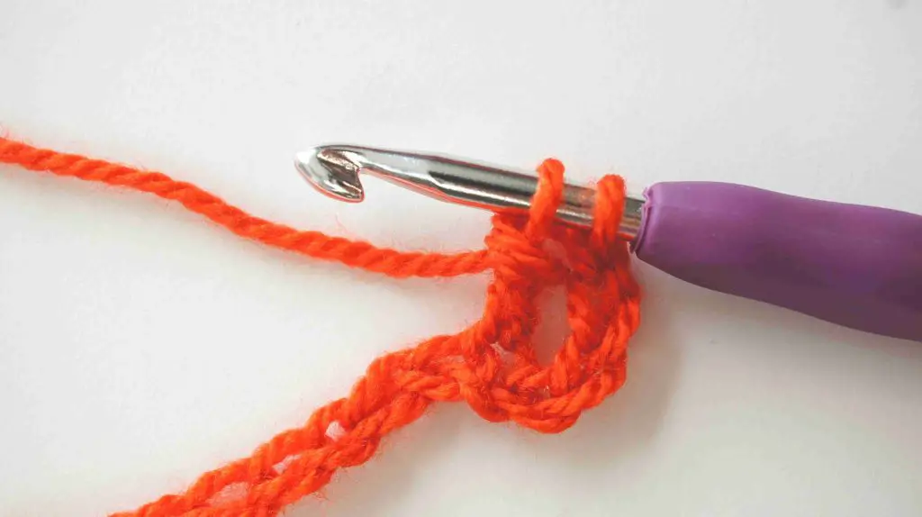 third step in double treble crochet stitch