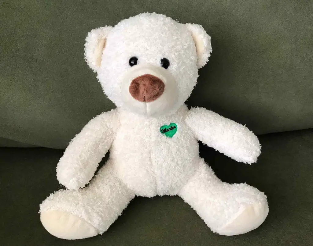 martin collectible bear green background