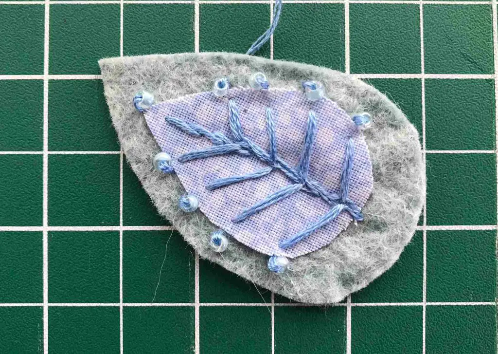 beads added to leaf brooch