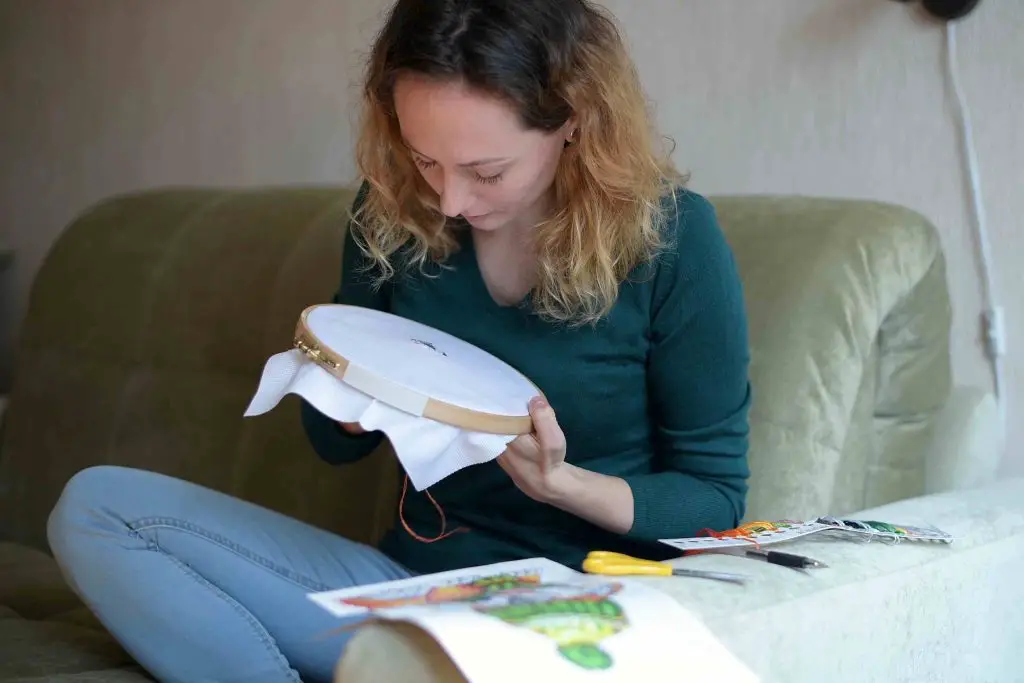 woman enjoying slow stitching