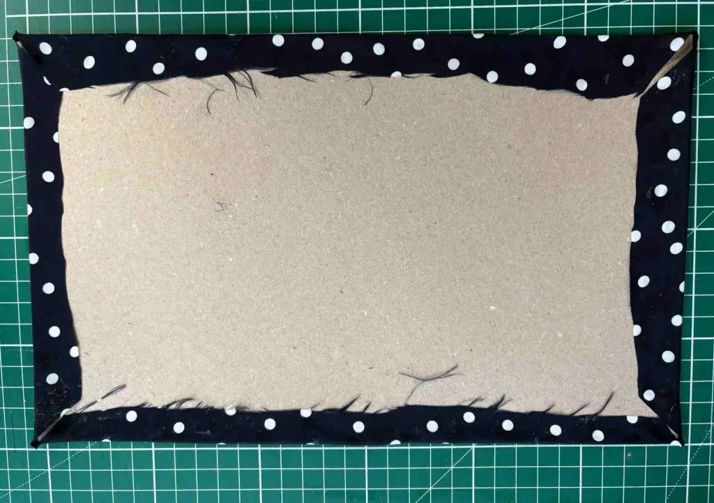 card covered in fabric for back of storage box