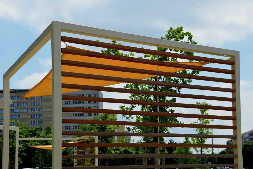 garden pergola with  yellow sunshade