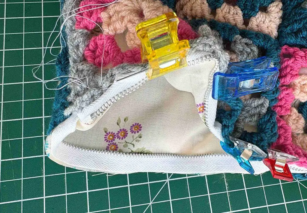 sewing lining into granny square bag
